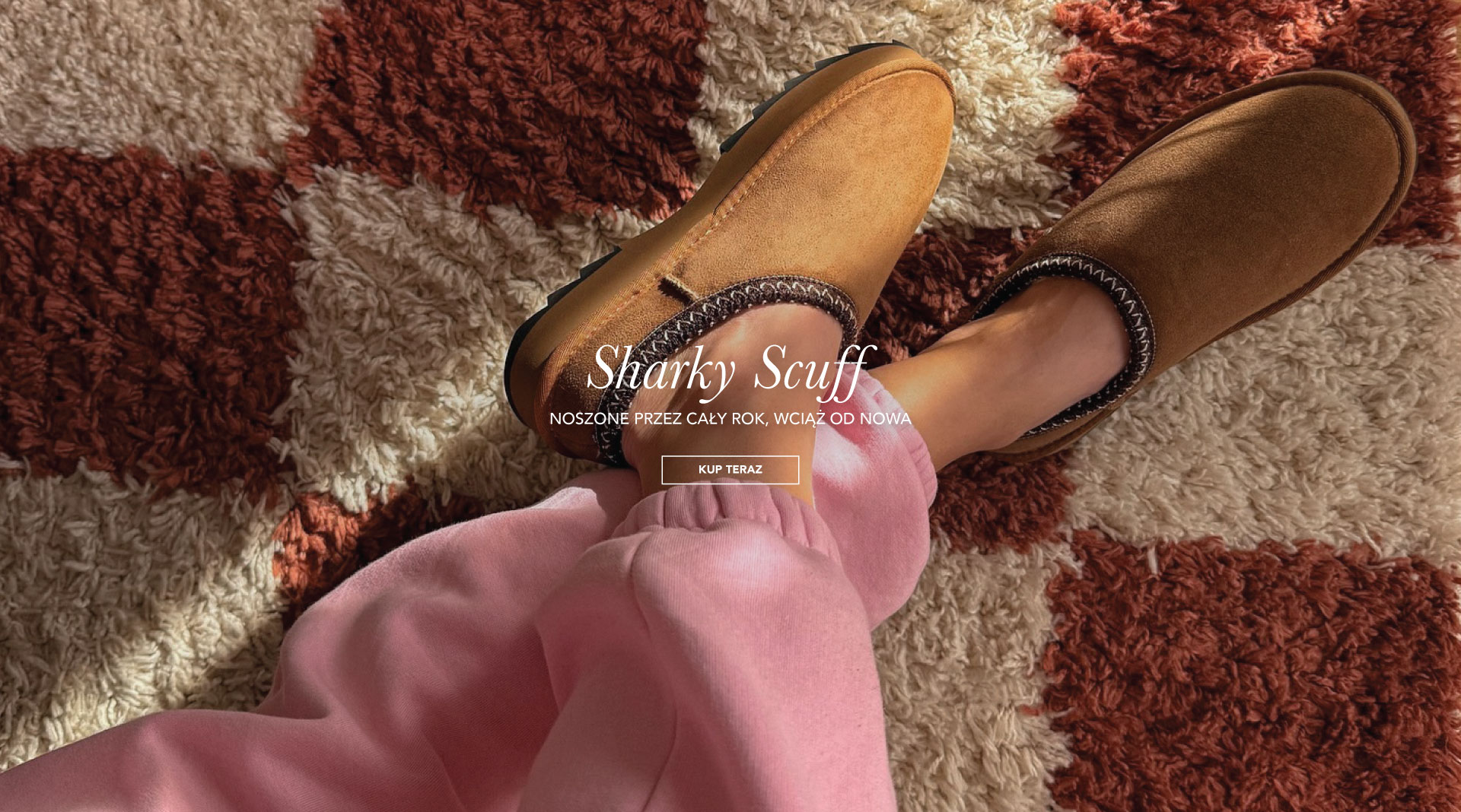 ADD ALT TEXT reads:The Sharky Scuff. Worn all year, on repeat. Shop Now.
