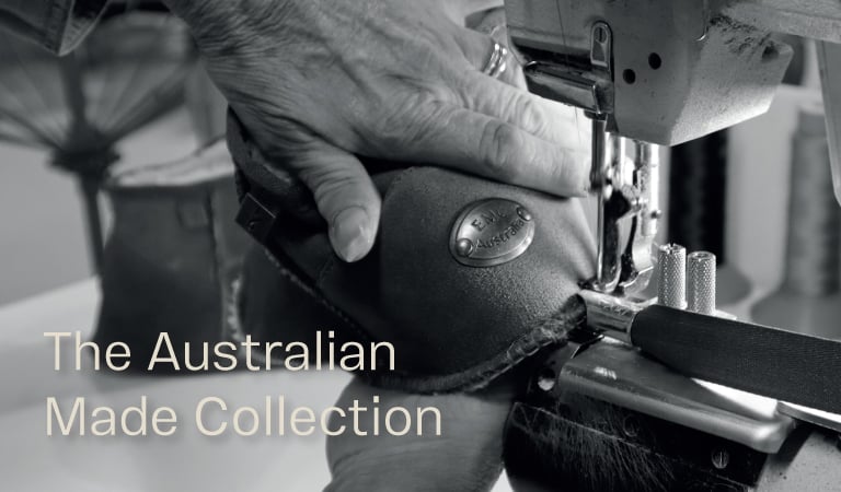 Image of hand made sheepskin boots, in the hands of a skilled maker. The Australian Made Collection.