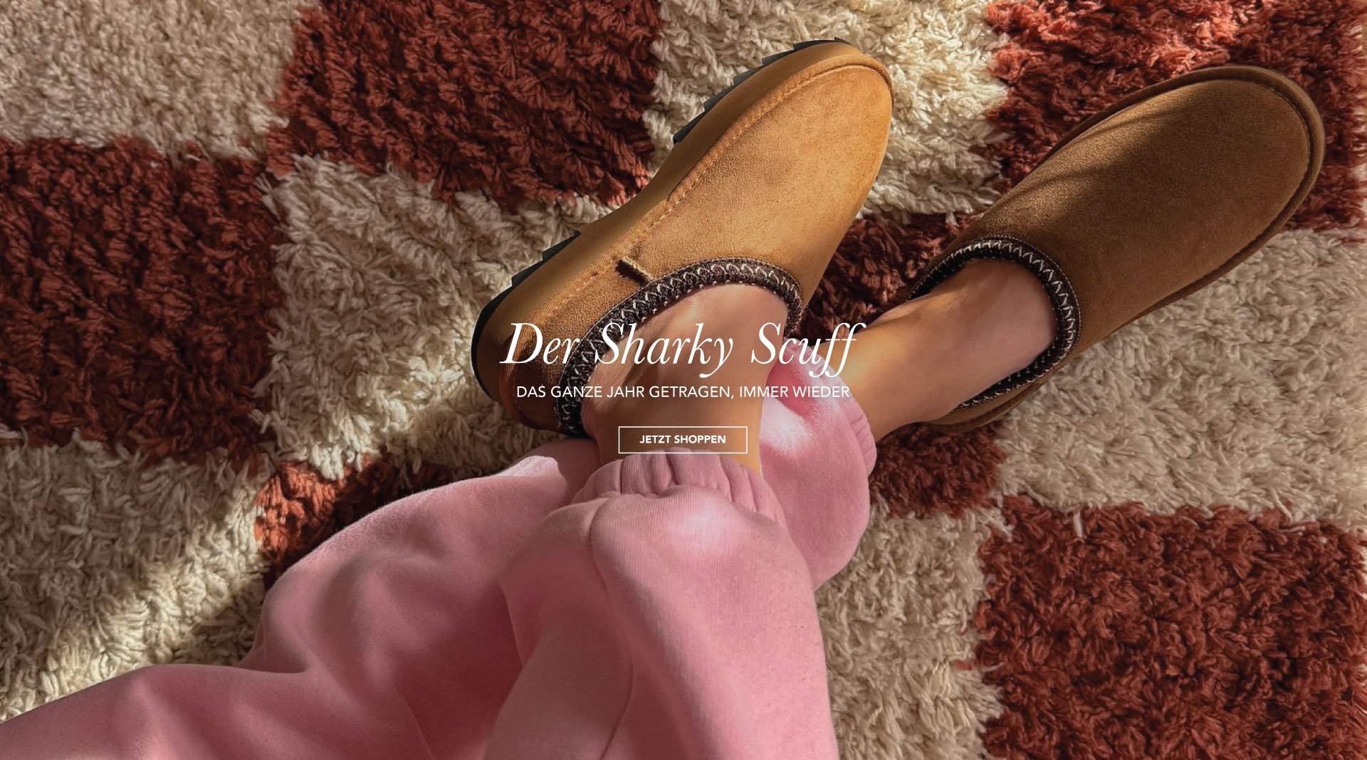 ADD ALT TEXT reads:The Sharky Scuff. Worn all year, on repeat. Shop Now.