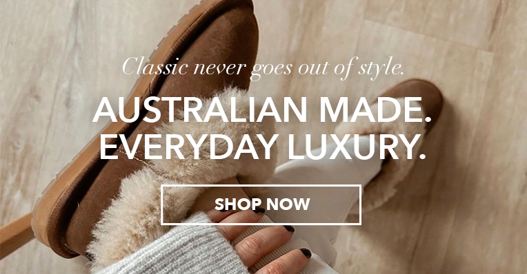 Woman wearing Platinum Mintaro sheepskin slippers. Classic never goes out of style. Australian Made. Everyday Luxury. Shop Now.