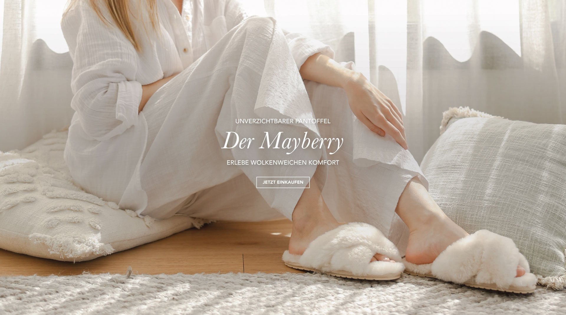 ADD ALT TEXT reads:Must-Have Slipper. The Mayberry. Experience cloud-like comfort. Shop Now.