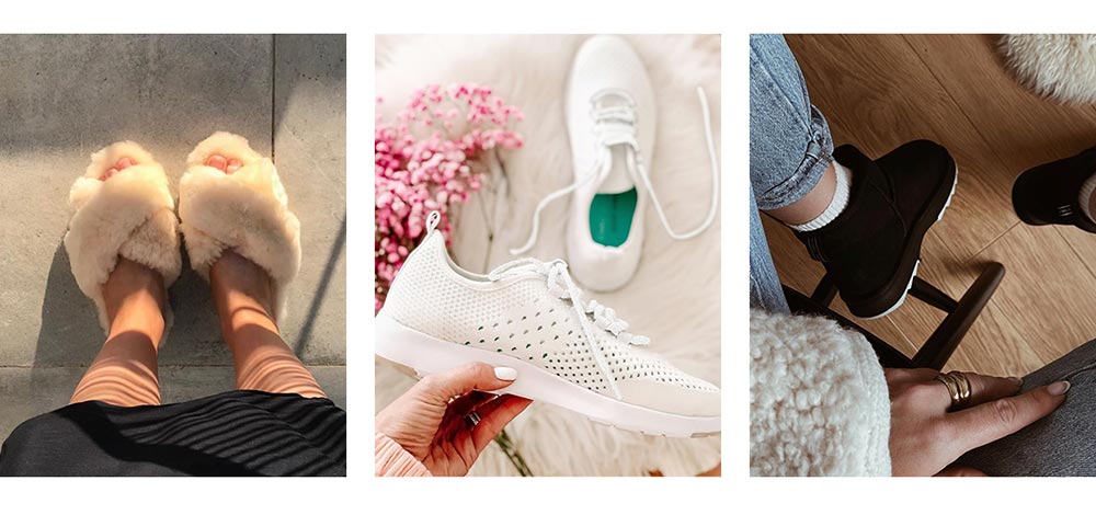 woman wearing natural Mayberry slippers, woman holding white Miki wool sneakers, woman wearing black Sharky Mini sheepskin boots