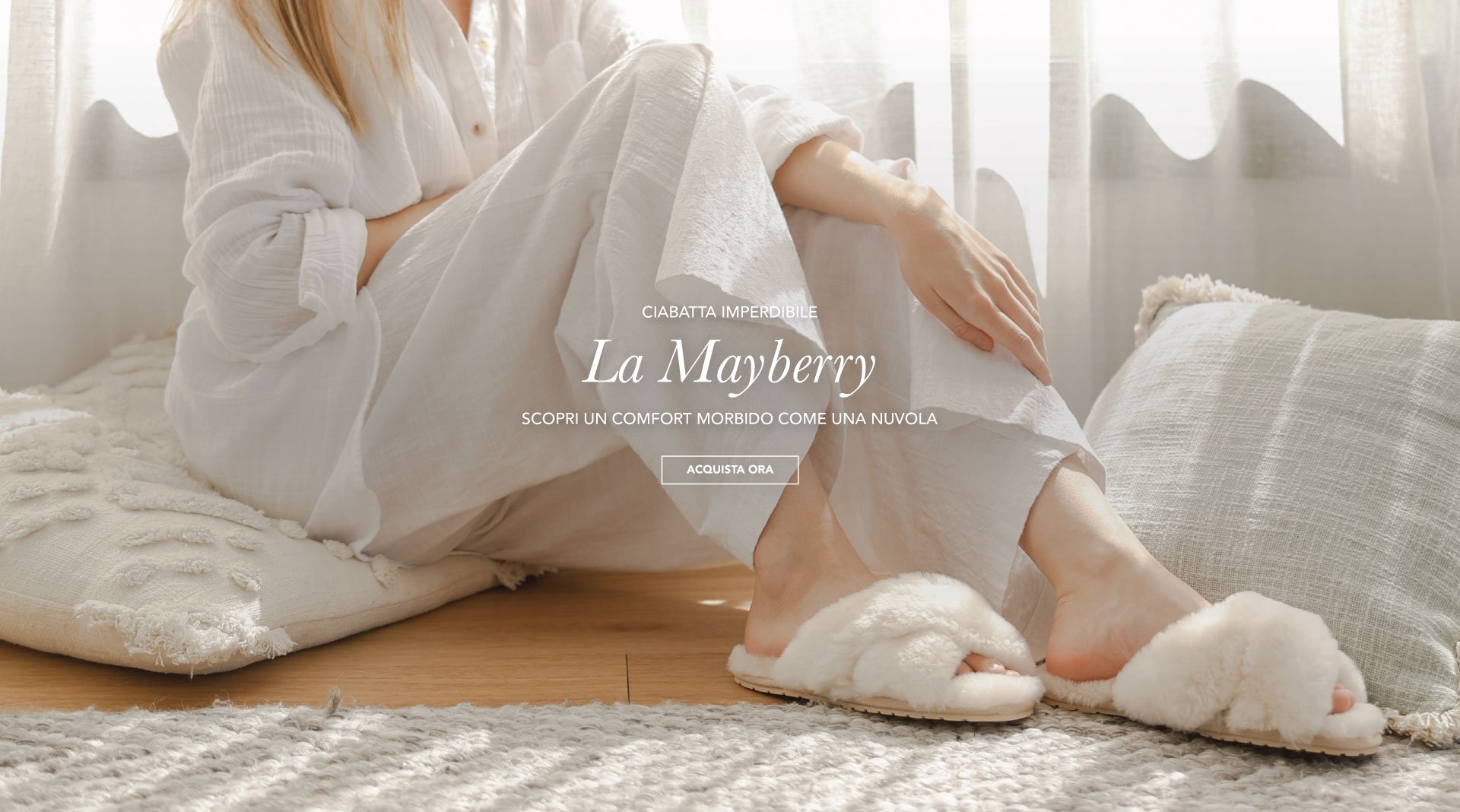 ADD ALT TEXT reads:Must-Have Slipper. The Mayberry. Experience cloud-like comfort. Shop Now.