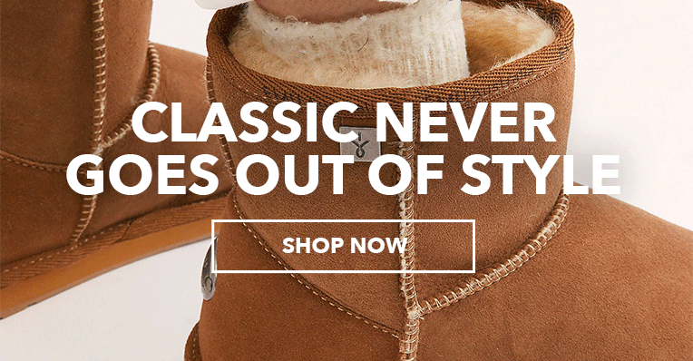 Person wearing white jeans and Australian Made sheepskin boots. Classic never goes out of style. Shop Now.